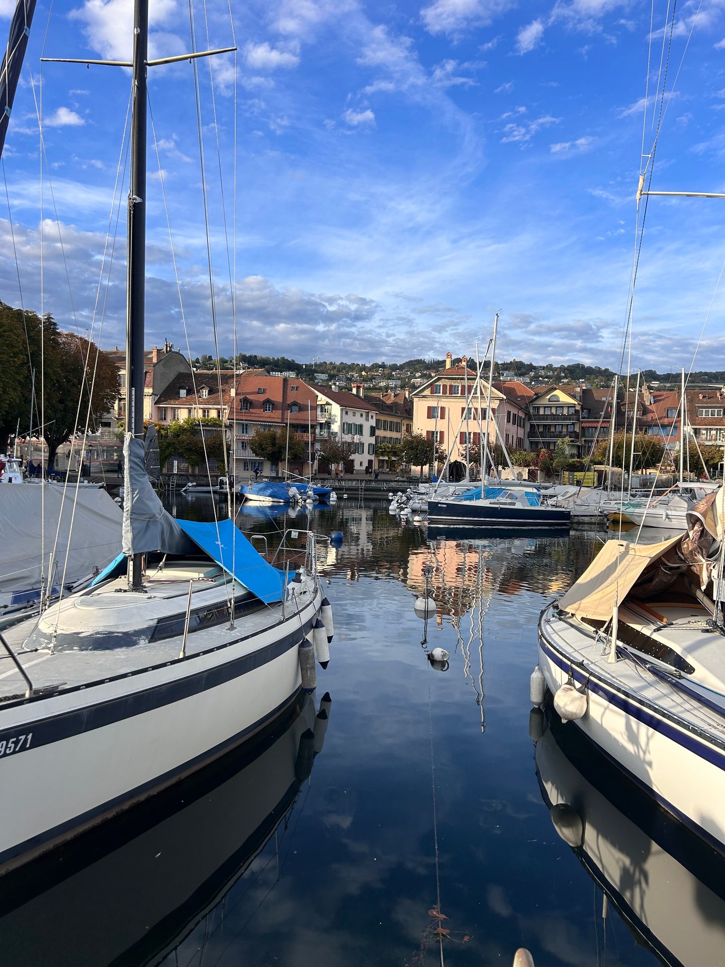9th October. Port de Lutry. Reflections and clouds. 10.5x26.5 cm